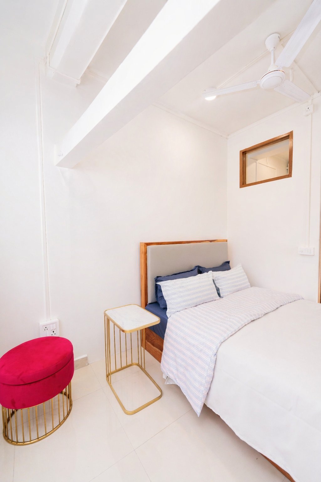 Single Room — cozy bed with side table